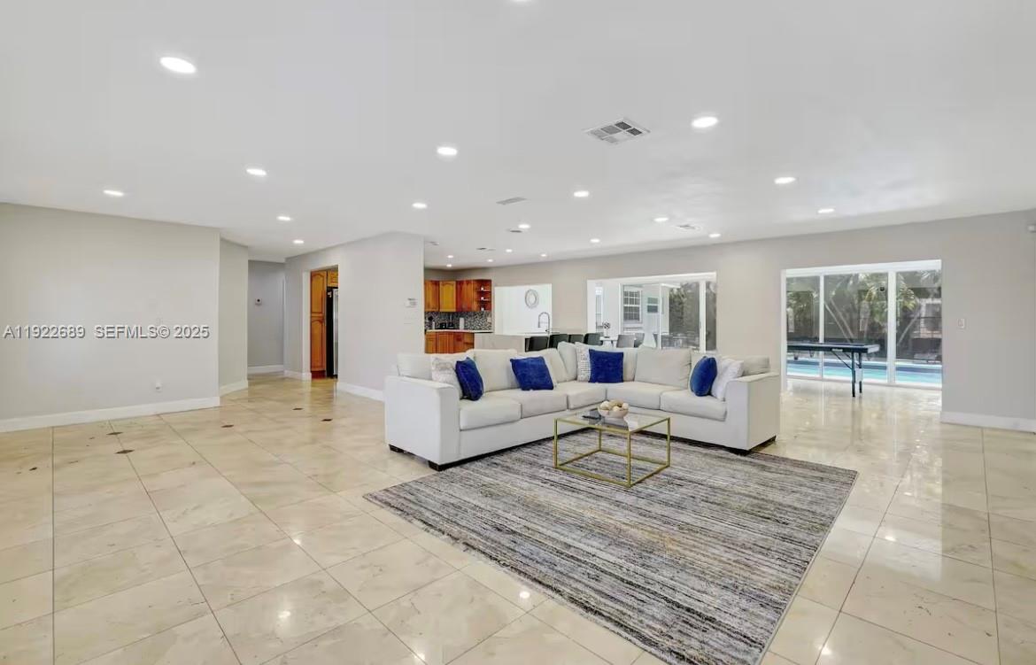 2080 Northeast 205th Street Miami, FL 33179 - Photo 4 of 24 a living room with furniture