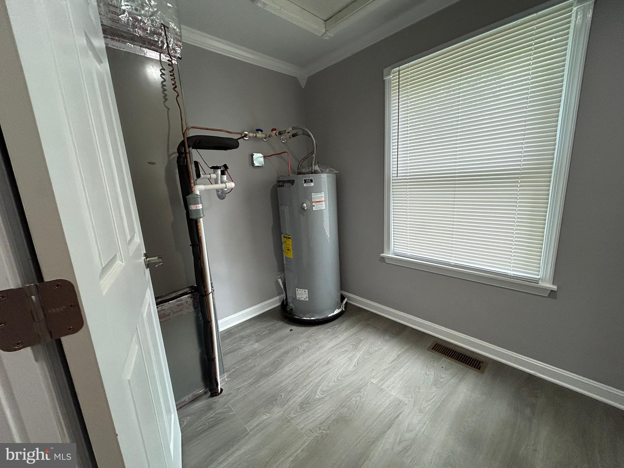 36697 Clubhouse Road Ocean View, DE 19970 - Photo 13 of 57 Large Utility Room: Furnace/Hot Water Heater &