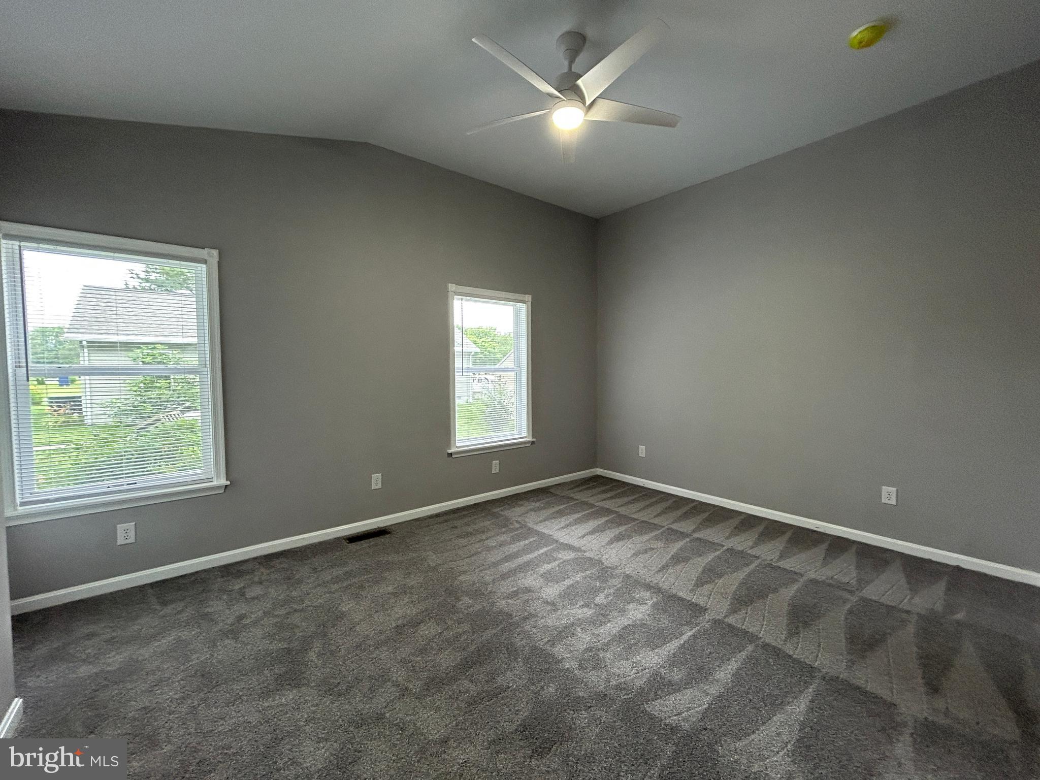 36697 Clubhouse Road Ocean View, DE 19970 - Photo 15 of 57 Primary Bedroom with vaulted ceilings