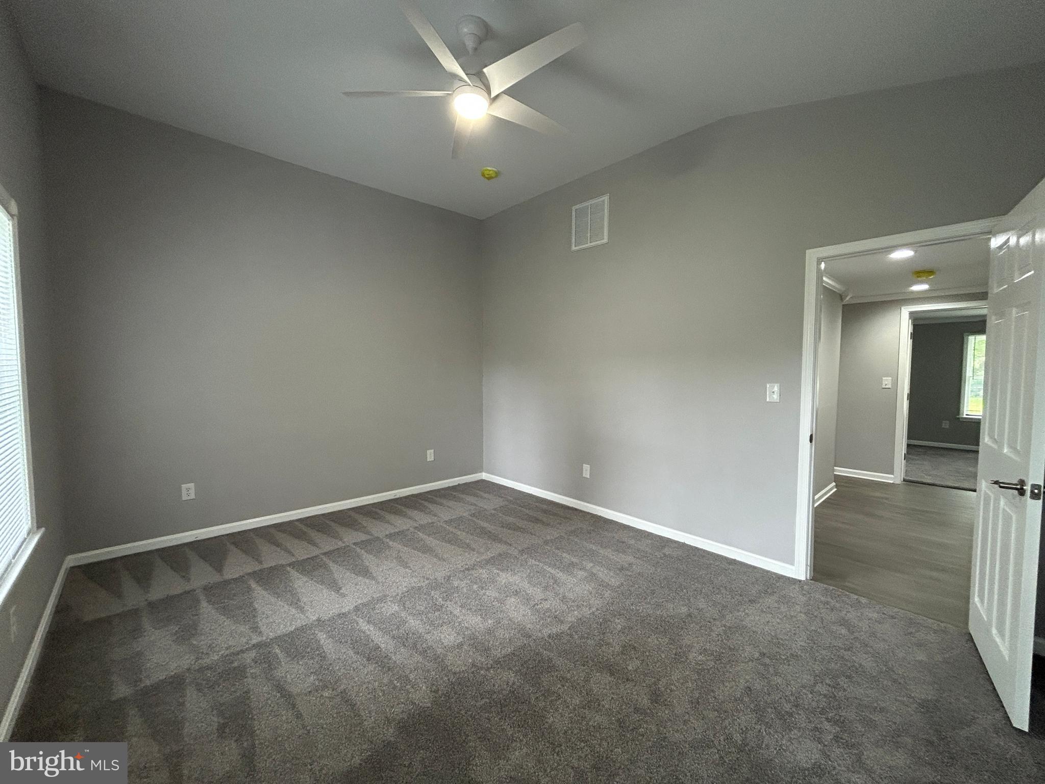36697 Clubhouse Road Ocean View, DE 19970 - Photo 19 of 57 Primary Bedroom -hallway also in view