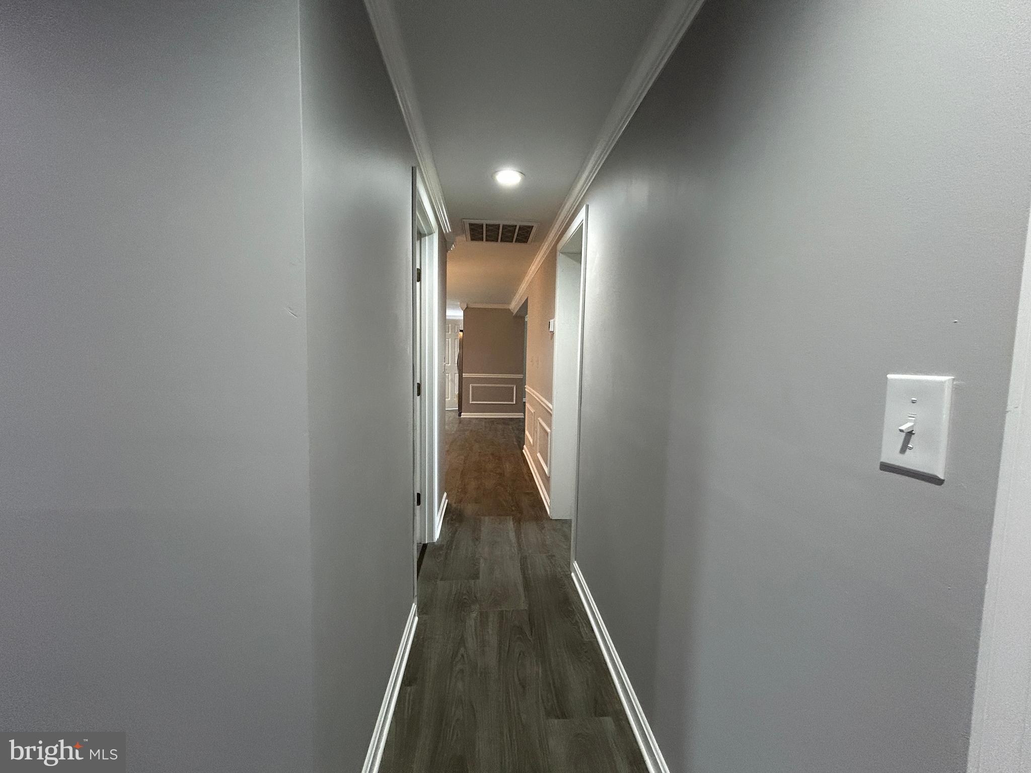 36697 Clubhouse Road Ocean View, DE 19970 - Photo 21 of 57 Hallway from L looking toward the kitchen.