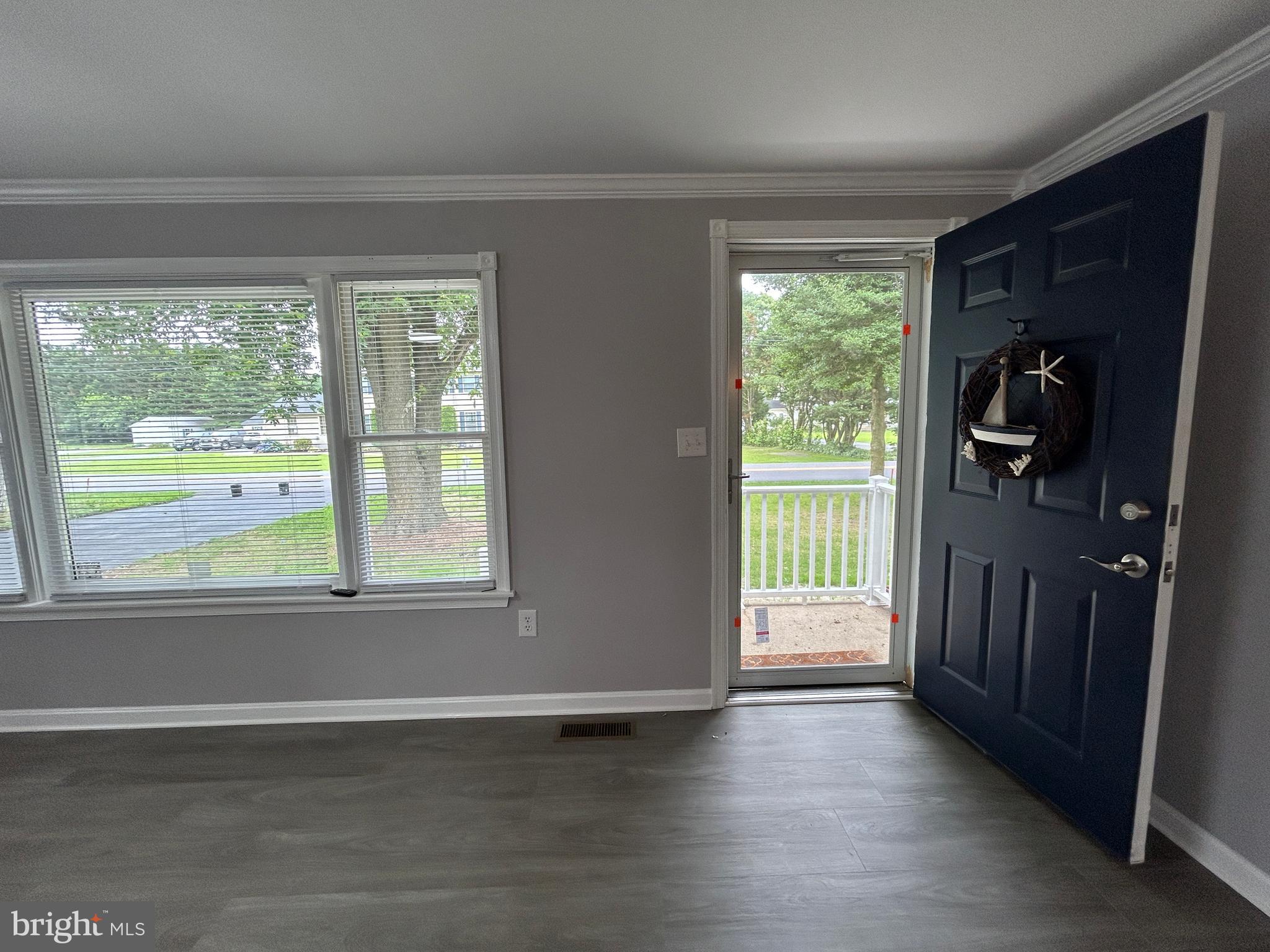 36697 Clubhouse Road Ocean View, DE 19970 - Photo 25 of 57 Window and open front door... welcome!