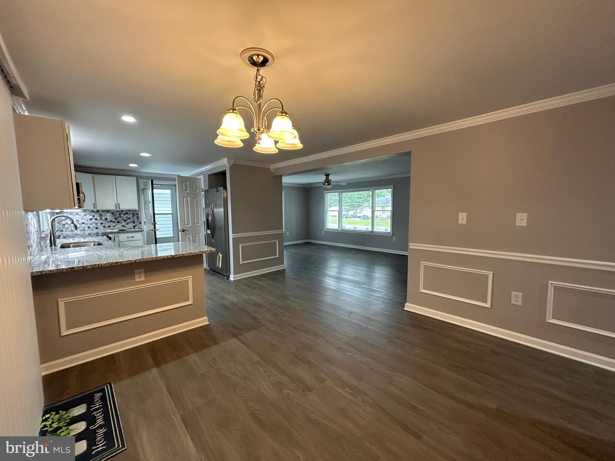 36697 Clubhouse Road Ocean View, DE 19970 - Photo 29 of 57 From Dining Room looking at kitchen and into LR