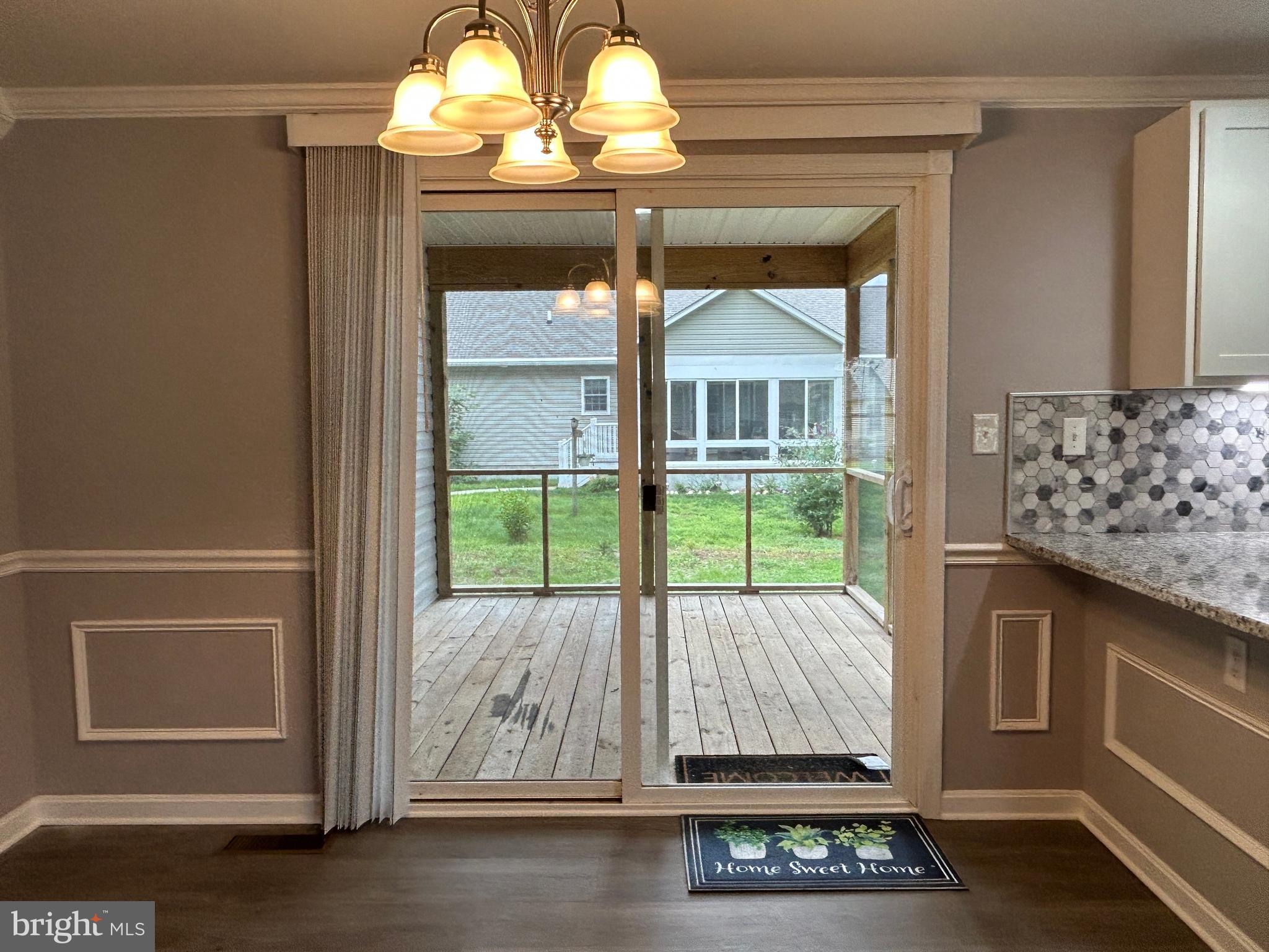 36697 Clubhouse Road Ocean View, DE 19970 - Photo 31 of 57 Dining Room Slider to Screened Porch