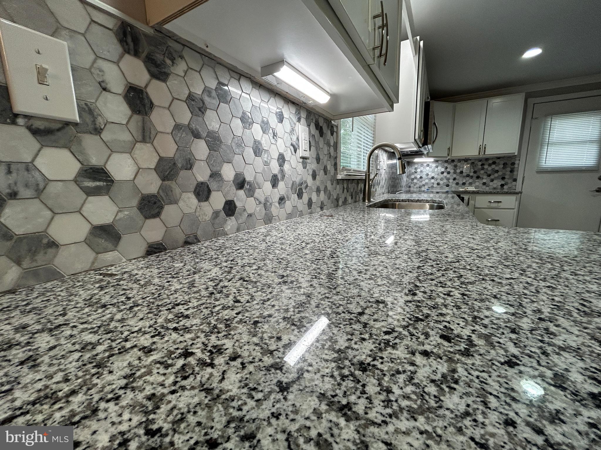 36697 Clubhouse Road Ocean View, DE 19970 - Photo 36 of 57 Awesome Granite, and amazing backsplash!