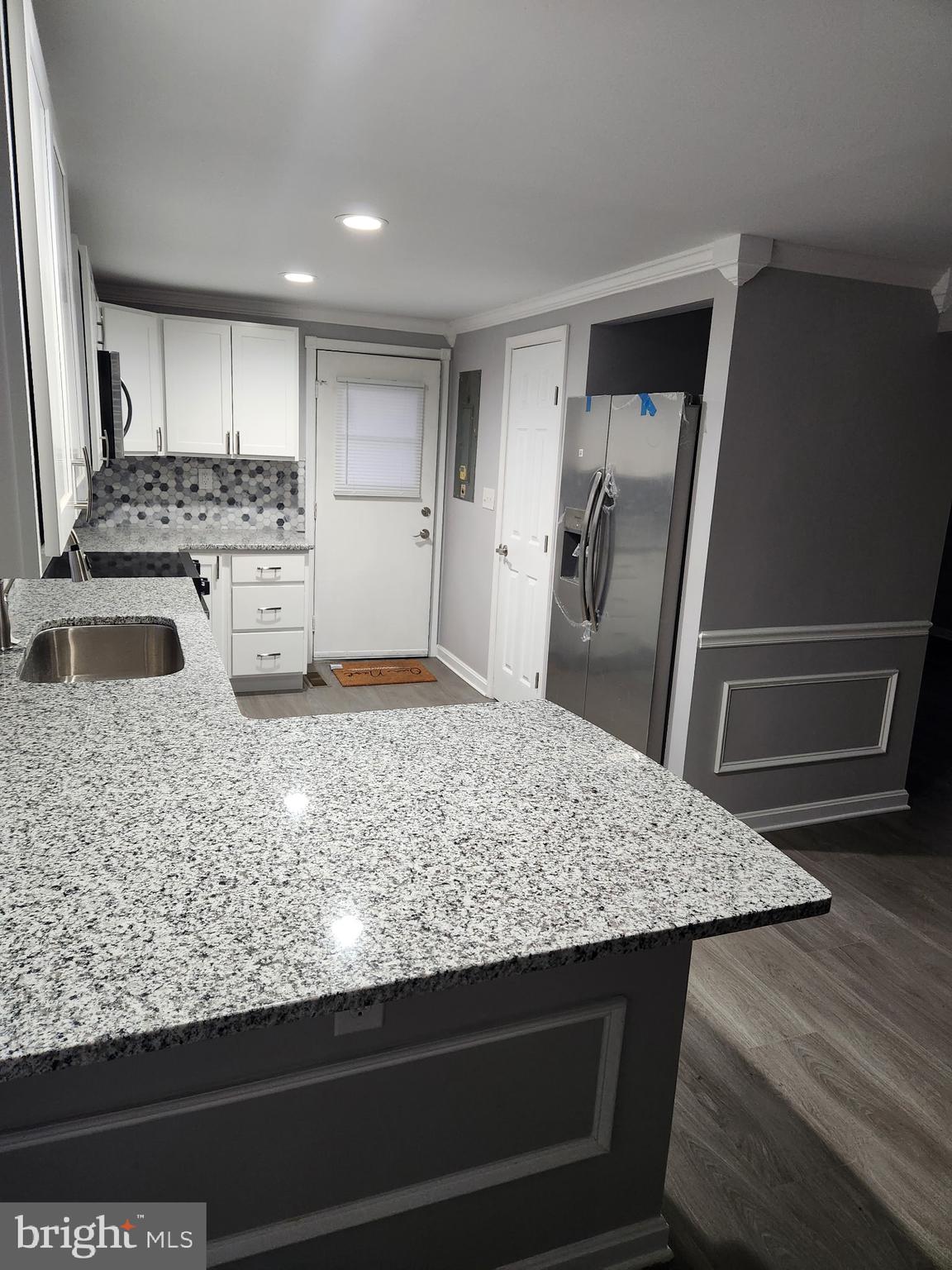 36697 Clubhouse Road Ocean View, DE 19970 - Photo 40 of 57 View of Side Door, Fridge, Pantry