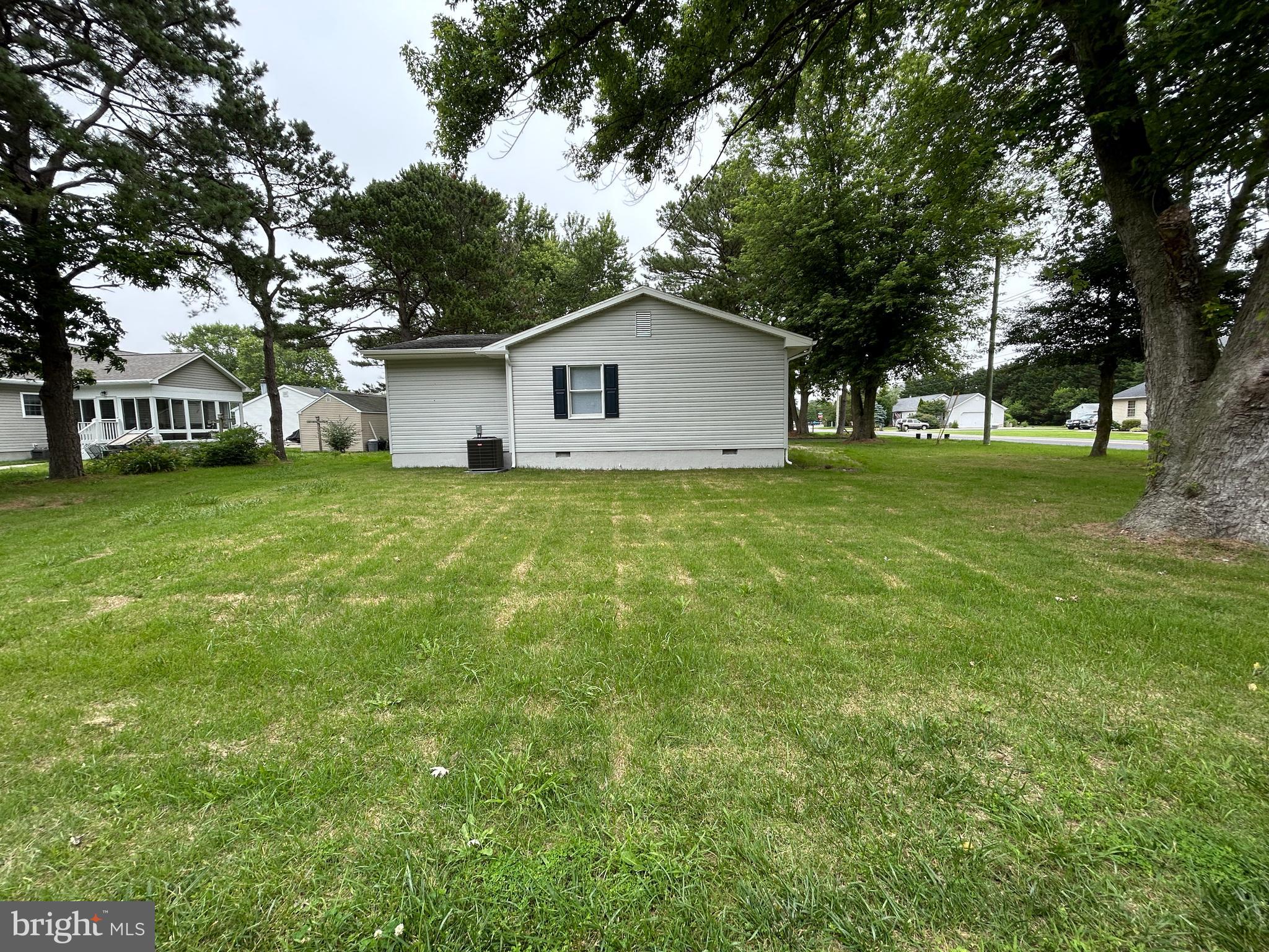 36697 Clubhouse Road Ocean View, DE 19970 - Photo 4 of 57 Side Yard of Corner Lot