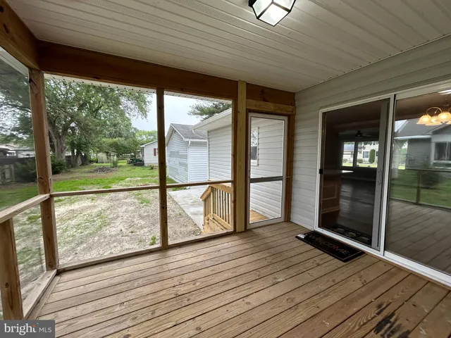 a front view of a house with a yard and a garage