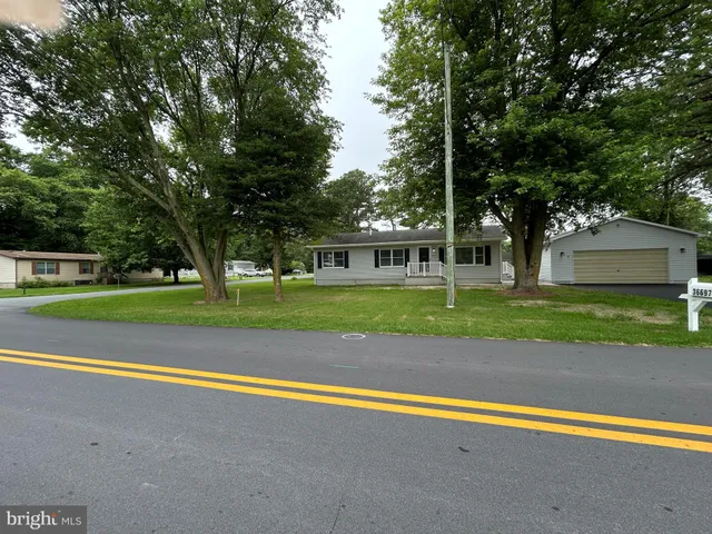 a view of a room with wooden walls
