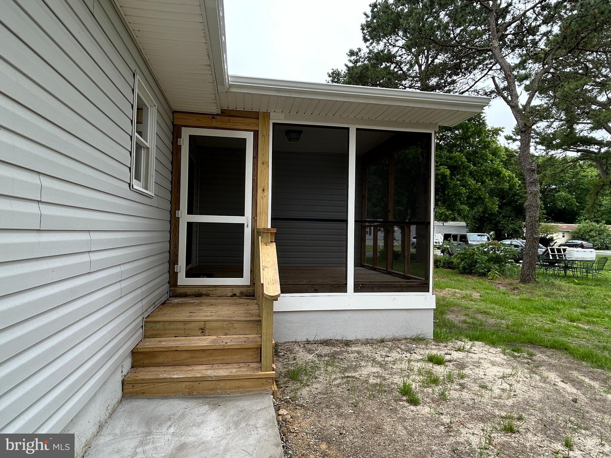 36697 Clubhouse Road Ocean View, DE 19970 - Photo 47 of 57 Steps to Screened Porch