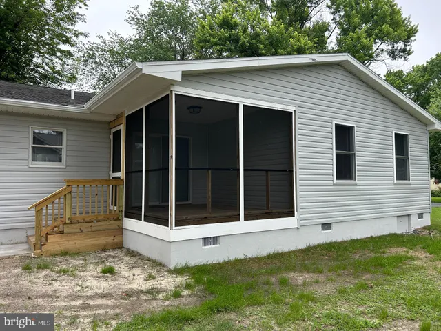 a view front of house with a garden