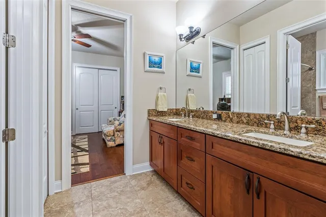 a house with swimming pool in front of it