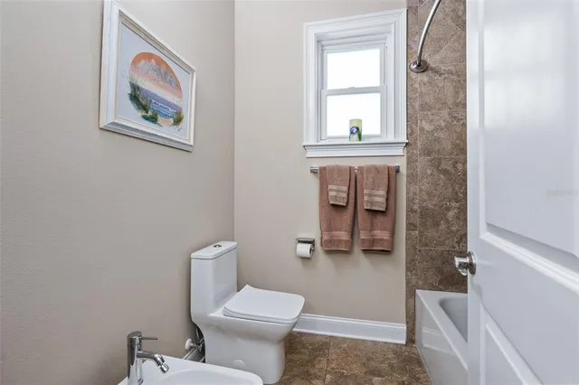 a house with garden in front of it