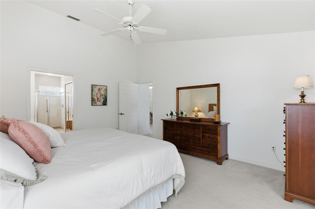 4030 Key Largo Lane Punta Gorda, FL 33955 - Photo 26 of 78 a bedroom with a bed and a mirror