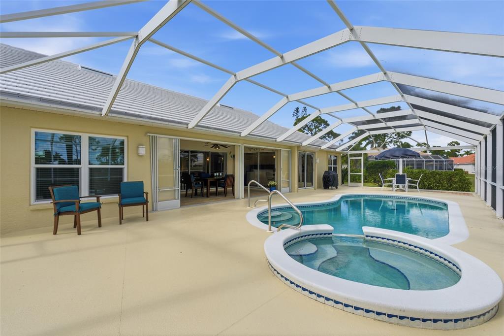 4030 Key Largo Lane Punta Gorda, FL 33955 - Photo 44 of 78 a view of a house with a swimming pool