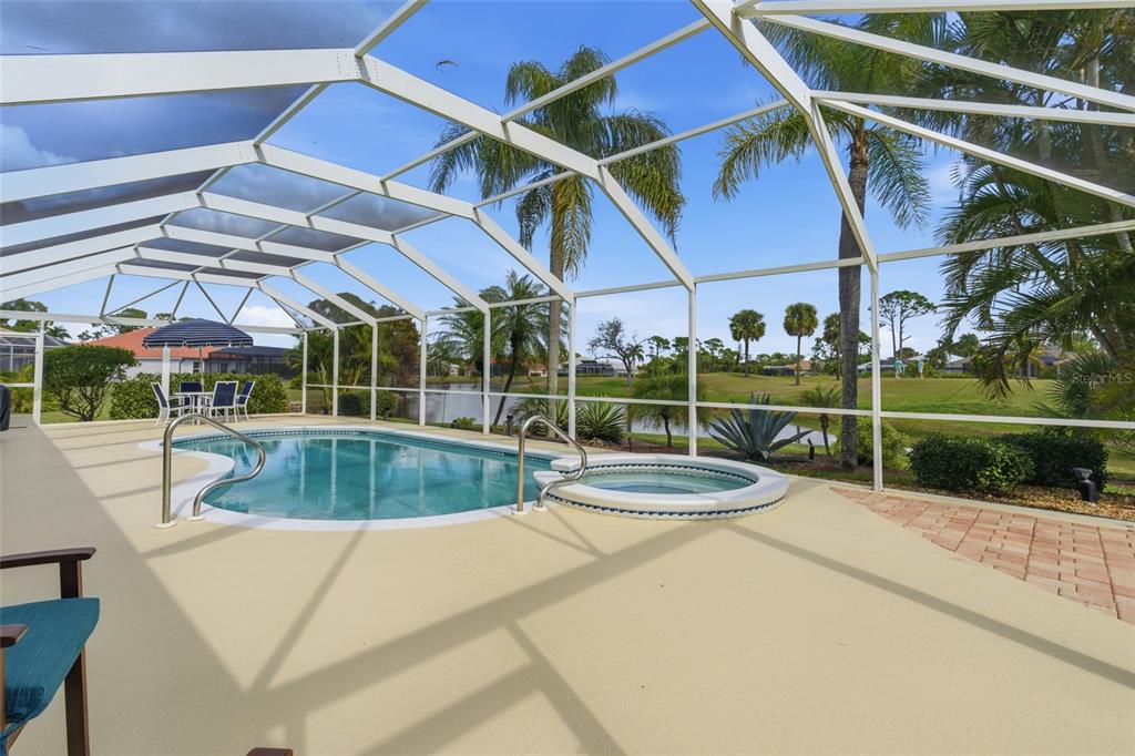4030 Key Largo Lane Punta Gorda, FL 33955 - Photo 45 of 78 a view of a patio with a table and chairs