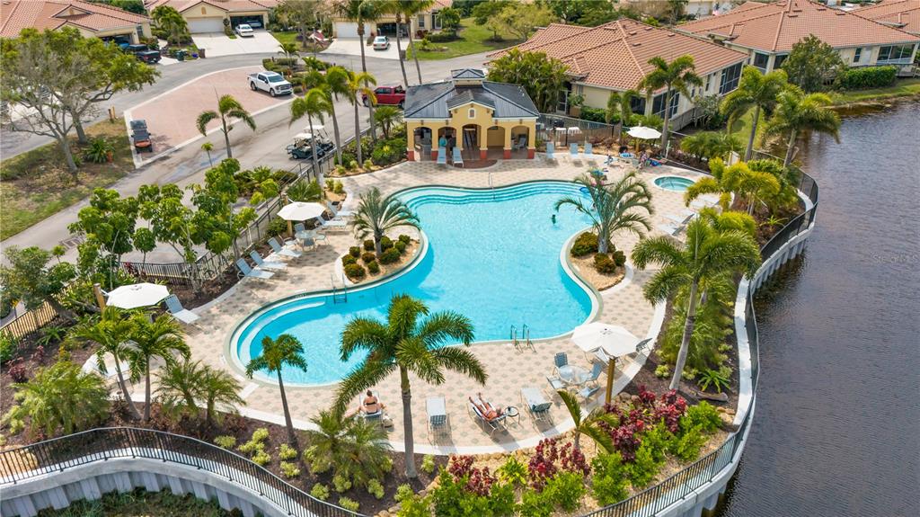 4030 Key Largo Lane Punta Gorda, FL 33955 - Photo 70 of 78 a view of a swimming pool with a garden