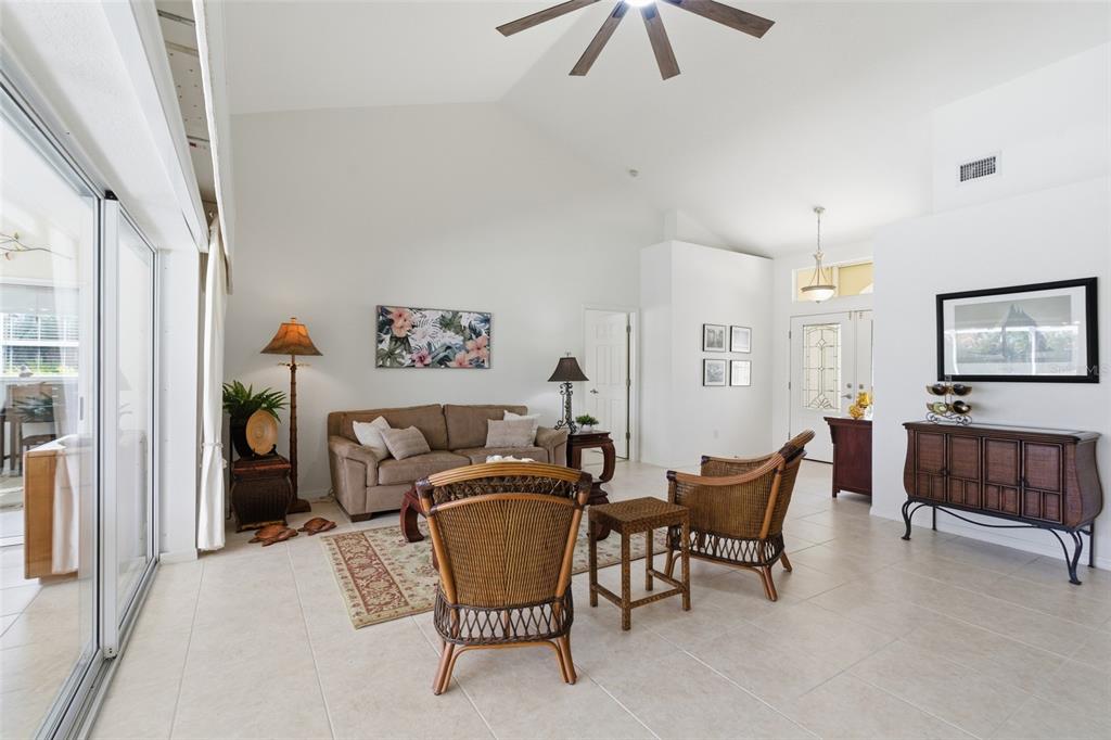 4030 Key Largo Lane Punta Gorda, FL 33955 - Photo 9 of 78 a living room with furniture and a flat screen tv