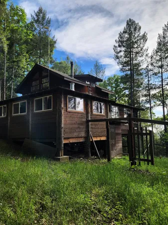 a view of a backyard with a garden