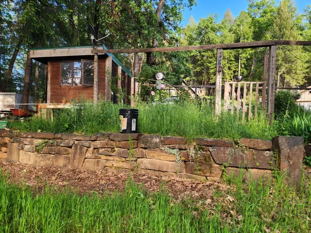 a view of a lounge chair and table in the balcony