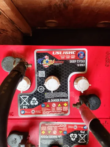 a view of a backyard with plants and a garden