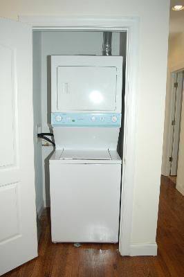 4751 North Virginia Avenue, Unit 2 Chicago, IL 60625 - Photo 6 of 8 a utility room with a washer and dryer