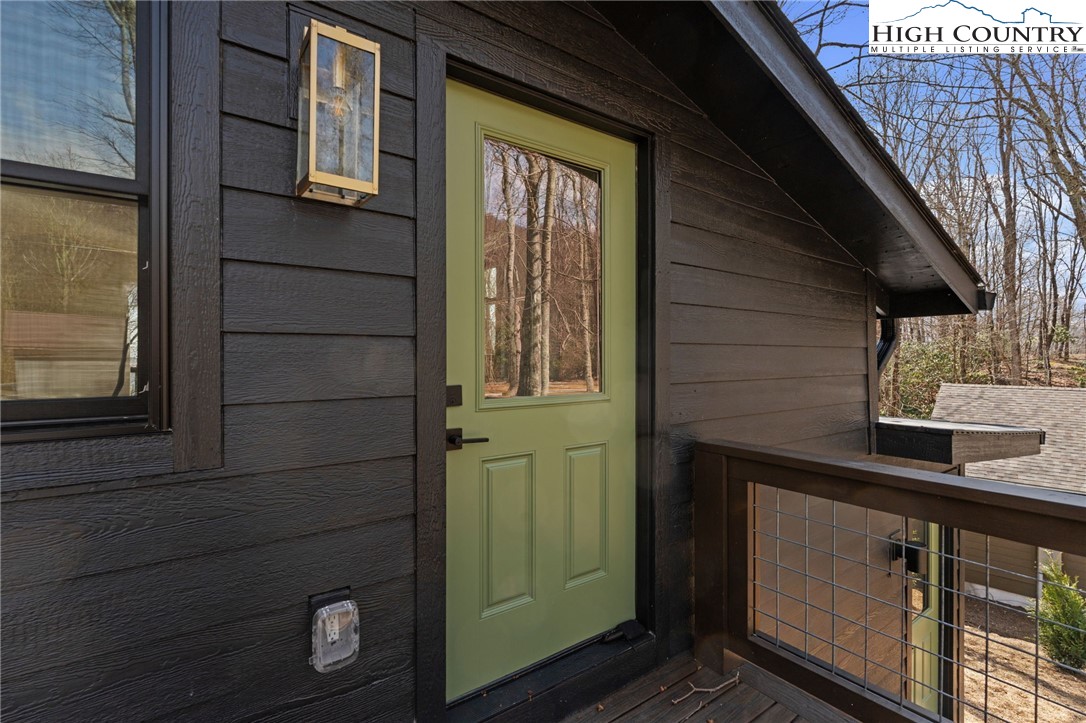 212 Chinkapin Ridge Road Seven Devils, NC 28604 - Photo 11 of 21 a view of front door of house