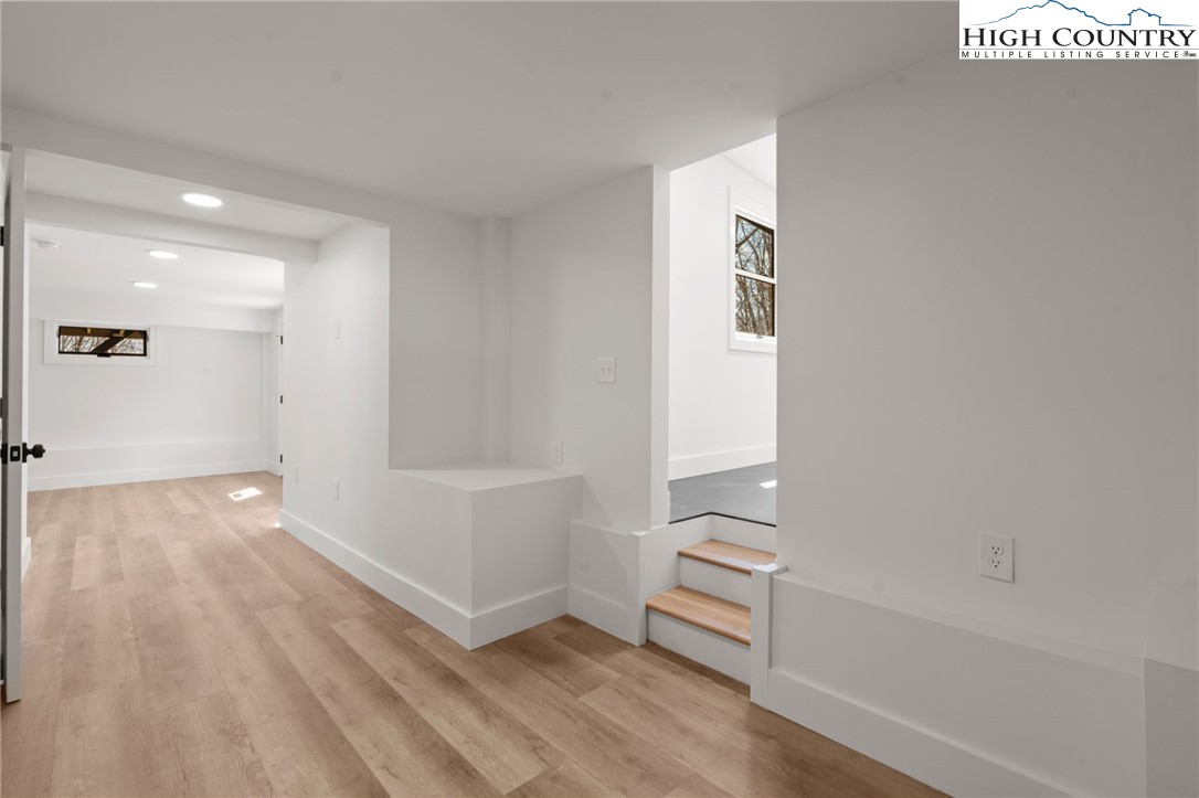 212 Chinkapin Ridge Road Seven Devils, NC 28604 - Photo 13 of 21 a view of an empty room and window