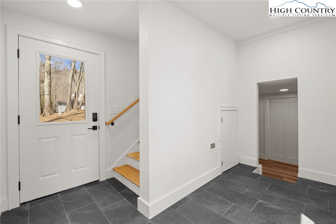 212 Chinkapin Ridge Road Seven Devils, NC 28604 - Photo 15 of 21 a view of an entryway with staircase