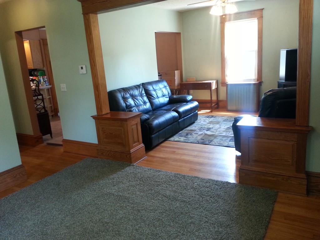26 Lorenzo Street Springfield, MA 01109 - Photo 12 of 12 a living room with furniture and a flat screen tv