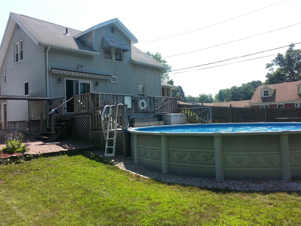 26 Lorenzo Street Springfield, MA 01109 - Photo 3 of 12 a view of a back yard of the house