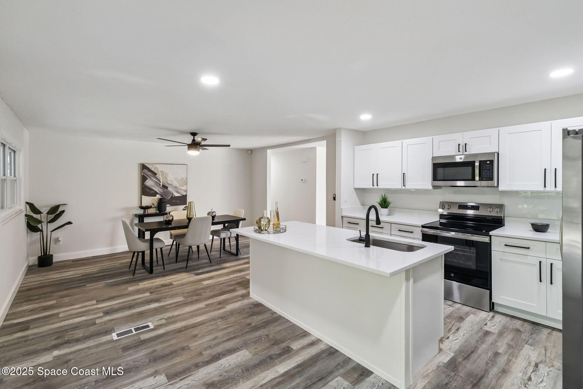 1527 Meadowbrook Road Northeast Palm Bay, FL 32905 - Photo 7 of 22 6-web-or-mls-1527_Meadowbrook_Rd_NE__Pal