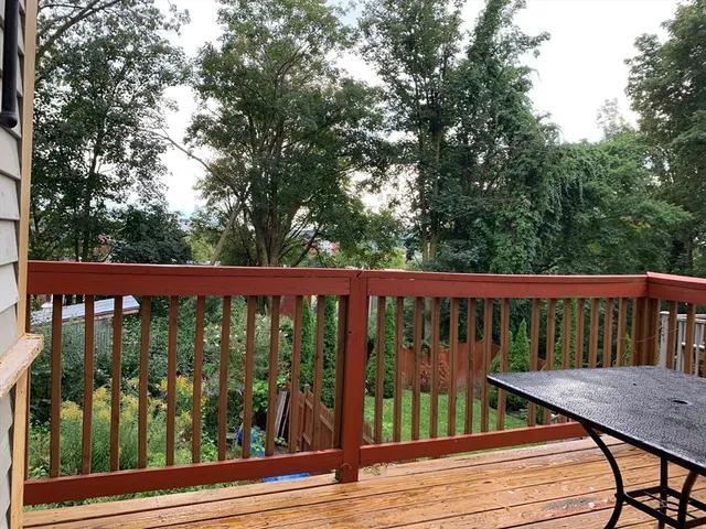 a view of a wooden roof deck