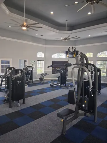 a living room with fireplace furniture and a window