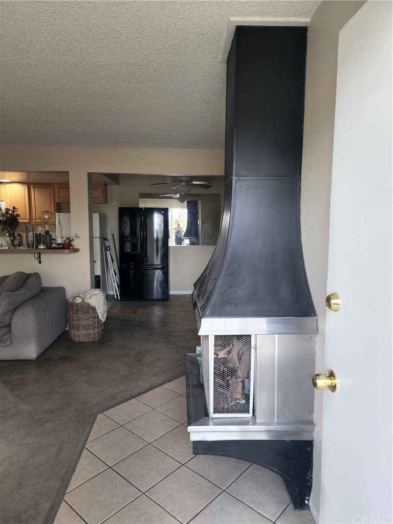 3098 Panorama Road, Unit B Riverside, CA 92506 - Photo 1 of 1 a living room with furniture and a window