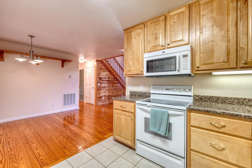 2478 High River Road Hiawassee, GA 30546 - Photo 17 of 67 a kitchen with a stove and a microwave