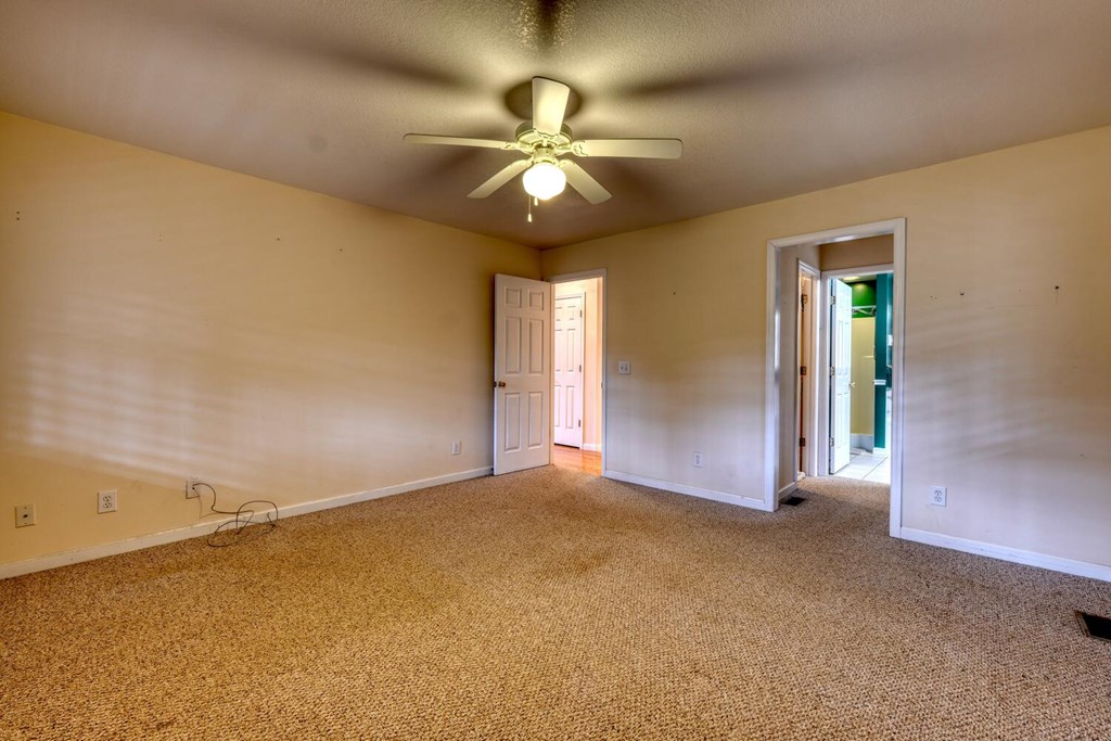 2478 High River Road Hiawassee, GA 30546 - Photo 19 of 67 a view of a livingroom with a ceiling fan and window
