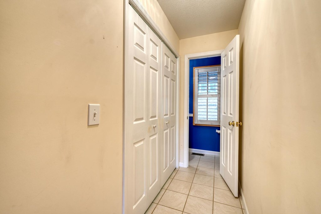 2478 High River Road Hiawassee, GA 30546 - Photo 23 of 67 a view of a hallway with a wooden door