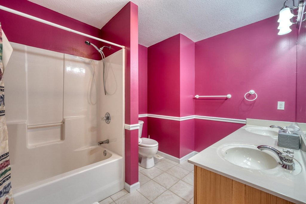 2478 High River Road Hiawassee, GA 30546 - Photo 33 of 67 a bathroom with a sink vanity tub and shower