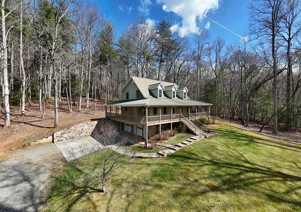 2478 High River Road Hiawassee, GA 30546 - Photo 46 of 67 a view of a house with backyard