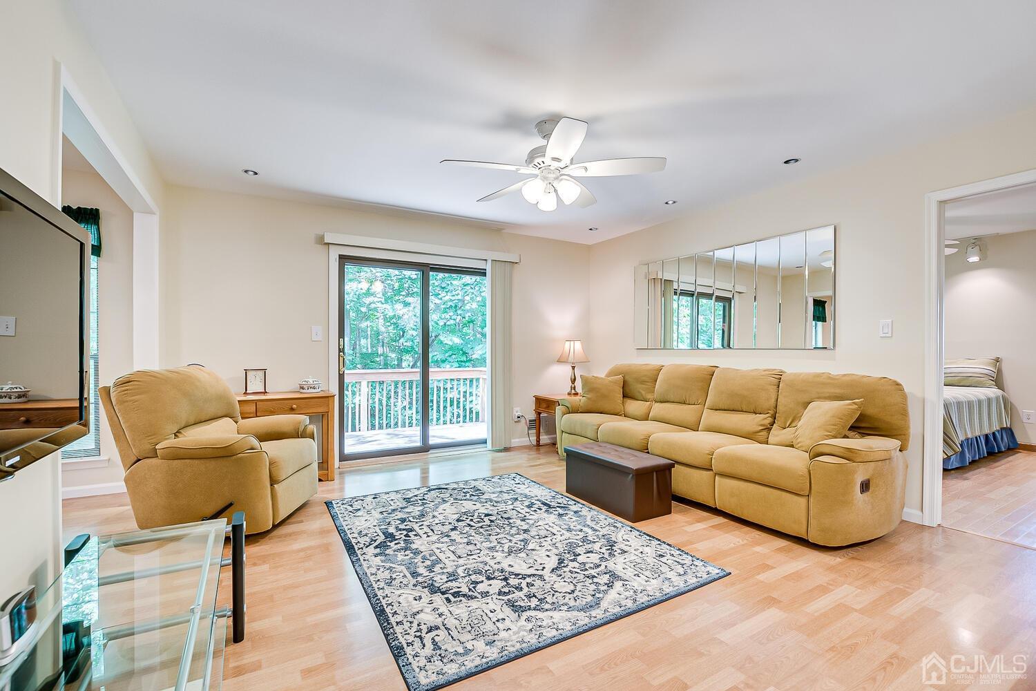 1606 Timber Oaks Road Edison, NJ 08820 - Photo 13 of 33 a living room with furniture and a rug
