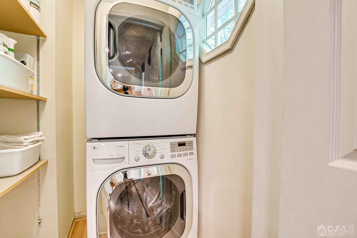 1606 Timber Oaks Road Edison, NJ 08820 - Photo 19 of 33 a utility room with dryer and washer