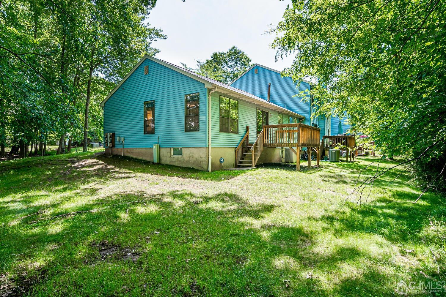 1606 Timber Oaks Road Edison, NJ 08820 - Photo 31 of 33 a view of a house with a backyard