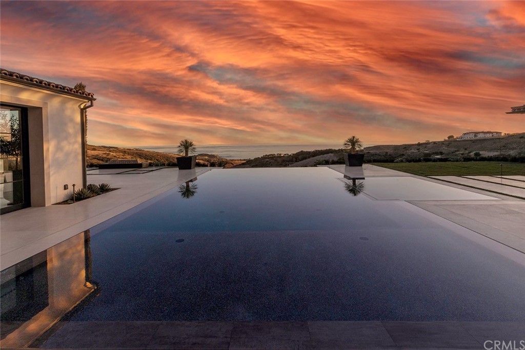 12 Swimmers Newport Coast, CA 92657 - Photo 13 of 38 a view of a street with an outdoor seating