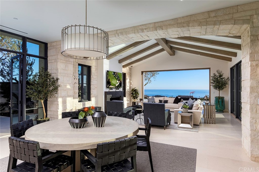 12 Swimmers Newport Coast, CA 92657 - Photo 18 of 38 a view of a dining room with furniture window and outside view