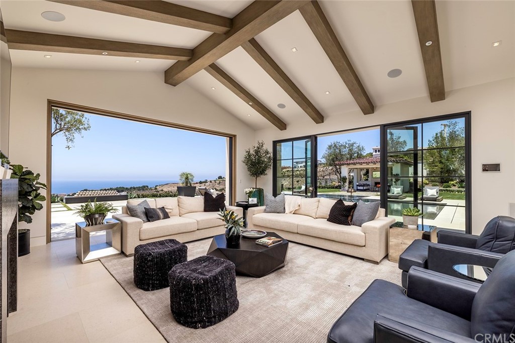 12 Swimmers Newport Coast, CA 92657 - Photo 19 of 38 a living room with furniture and a large window