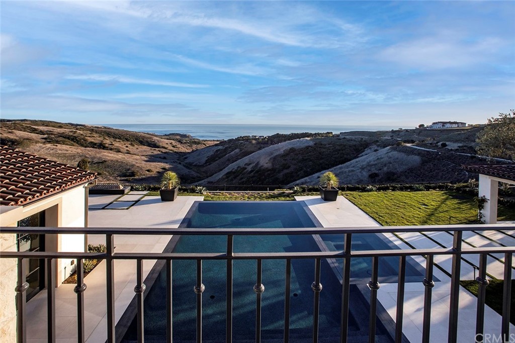 12 Swimmers Newport Coast, CA 92657 - Photo 34 of 38 a view of a balcony with an outdoor seating