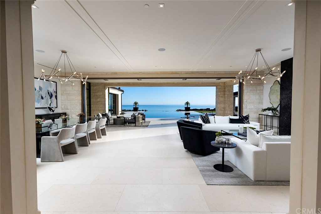 12 Swimmers Newport Coast, CA 92657 - Photo 4 of 38 a living room with furniture and a large window