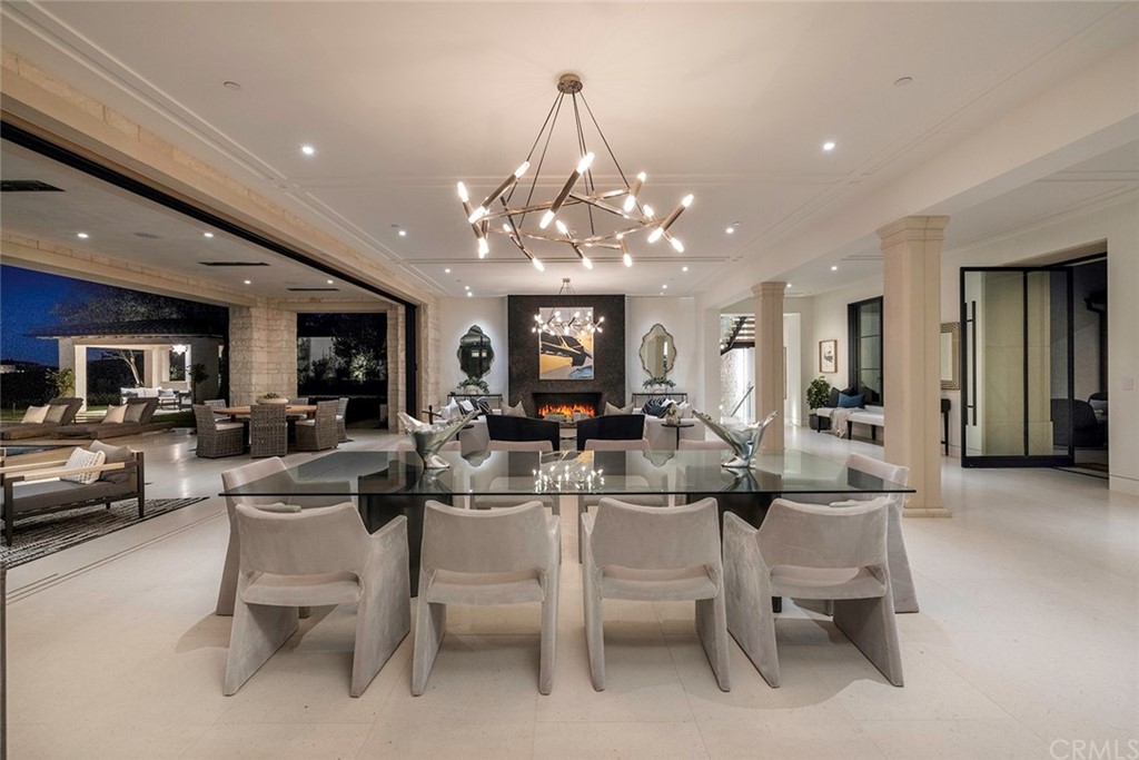 12 Swimmers Newport Coast, CA 92657 - Photo 5 of 38 a view of a dining room with furniture and a chandelier