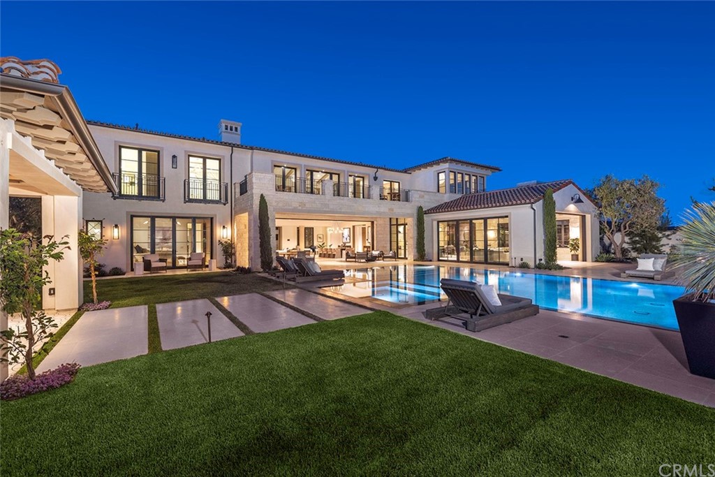 12 Swimmers Newport Coast, CA 92657 - Photo 9 of 38 a view of a house with swimming pool lawn chairs and a yard